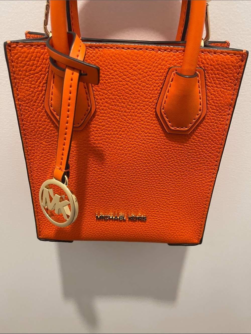 Michael Kors Bright Orange Pebbled Mini Tote with Gold MK Charm